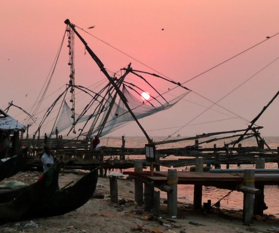 Sunset over fishing nets in Kochi, Kerala