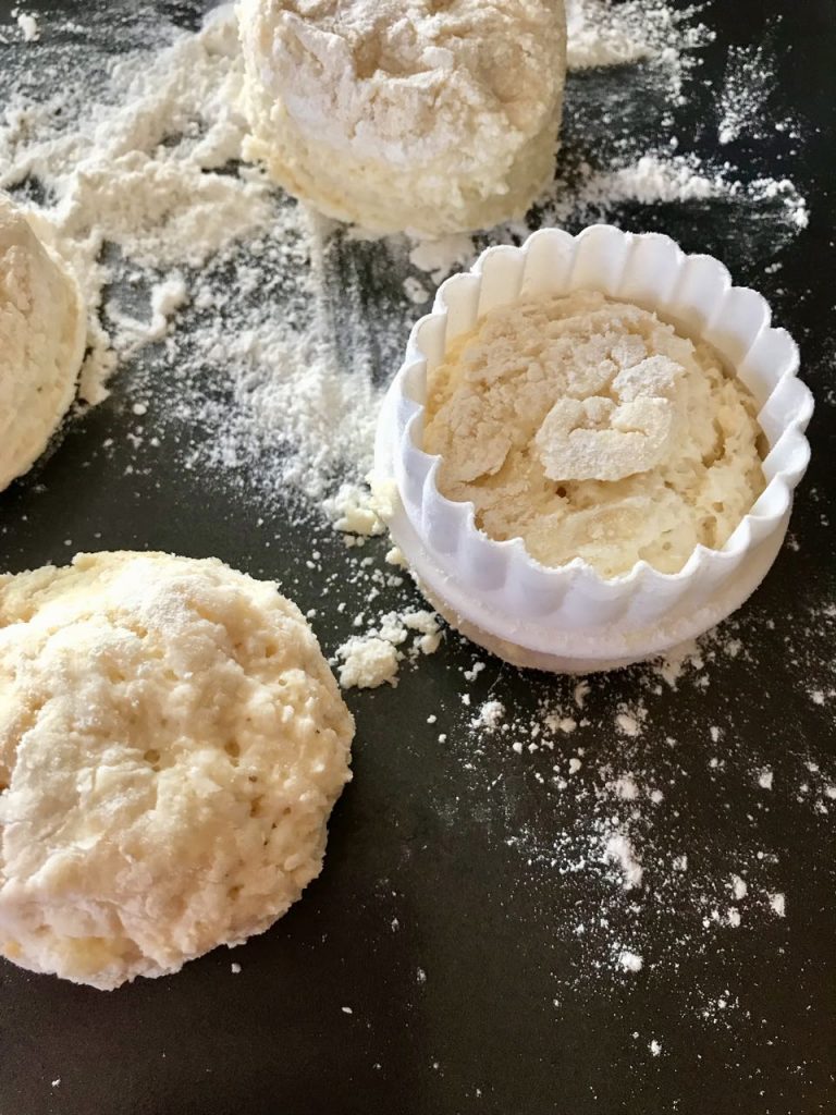 Place scones on floured tray