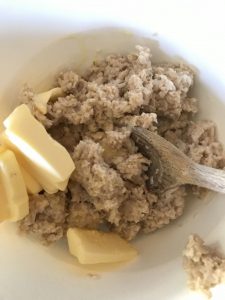 Cooked porridge with butter